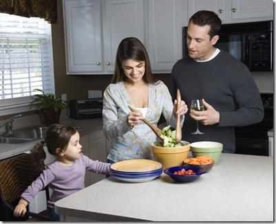 Family in kitchen.