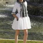 A model presents a creation by German designer Lagerfeld as part of his 2012-2013 Cruise collection show for French fashion house Chanel at the Chateau de Versailles