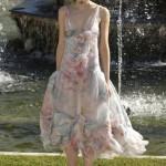 A model presents a creation by German designer Lagerfeld as part of his 2012-2013 Cruise collection show for French fashion house Chanel at the Chateau de Versailles