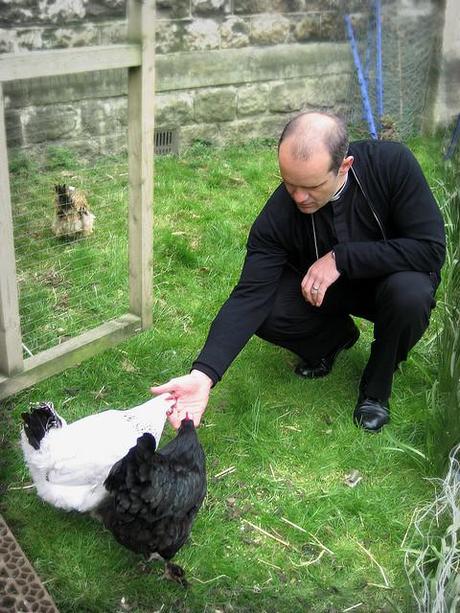Father Andrew tends to his flock