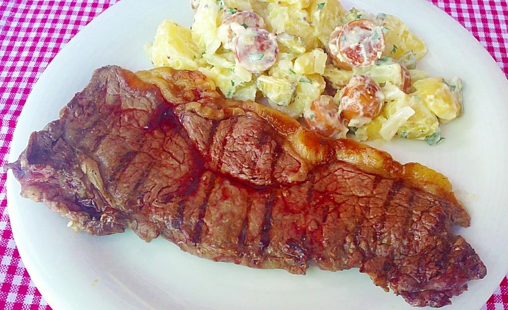Entrecot de buey con ensalada alemana
