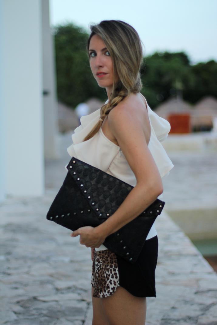 Outfit trends for summer 2012: ruffles top and leopard with envelope clutch.