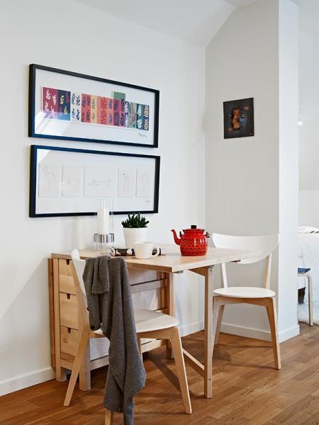 Ático de 50m² abuhardillado sofás de ikea muebles de madera de terraza muebles blancos decoración ikea inspiración salones ikea expedit foto estilo nórdico estilo escandinavo decorar terrazas decorar pisos decorar con muebles de ikea decoración estilo nórdico decoración diáfana decoración de áticos comedores ikea cocinas ikea cocina blanca blog deco blog de interiorismo blog de decoración ático diáfano