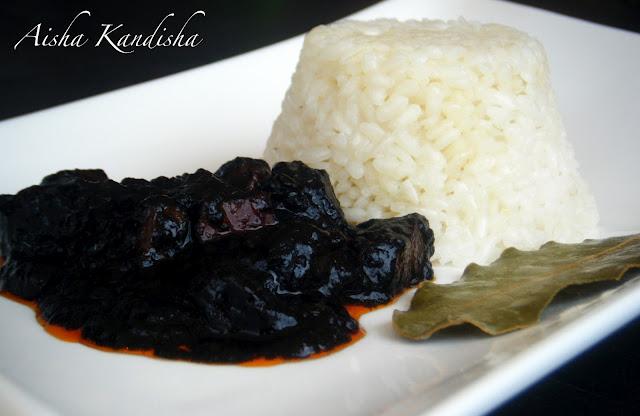 TACOS DE POTA EN TINTA CON ARROZ DE ACOMPAÑAMIENTO