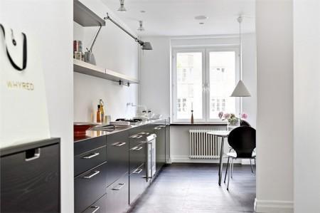 sillas eames decoración muebles de diseño decoración mecedora blanca eames decoración lámparas de diseño fotos pisos suecos estilo nórdico diseño de interiores decorar casas decoración pisos pequeños decoración escandinava decoración en blanco y negro decoración de interiores deco blog cocinas negras cocinas modernas cocinas en blanco y negro blog interiores blog decoración sueca blog decoración nórdica blog de interiorismo 