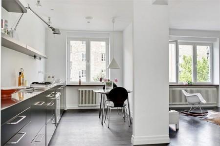 sillas eames decoración muebles de diseño decoración mecedora blanca eames decoración lámparas de diseño fotos pisos suecos estilo nórdico diseño de interiores decorar casas decoración pisos pequeños decoración escandinava decoración en blanco y negro decoración de interiores deco blog cocinas negras cocinas modernas cocinas en blanco y negro blog interiores blog decoración sueca blog decoración nórdica blog de interiorismo 