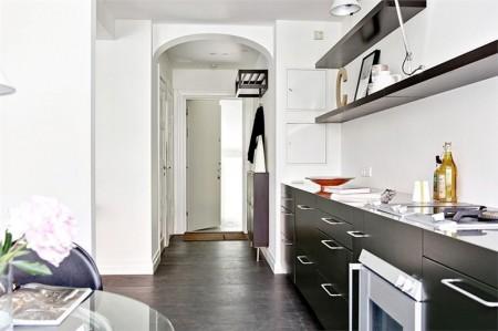 sillas eames decoración muebles de diseño decoración mecedora blanca eames decoración lámparas de diseño fotos pisos suecos estilo nórdico diseño de interiores decorar casas decoración pisos pequeños decoración escandinava decoración en blanco y negro decoración de interiores deco blog cocinas negras cocinas modernas cocinas en blanco y negro blog interiores blog decoración sueca blog decoración nórdica blog de interiorismo 