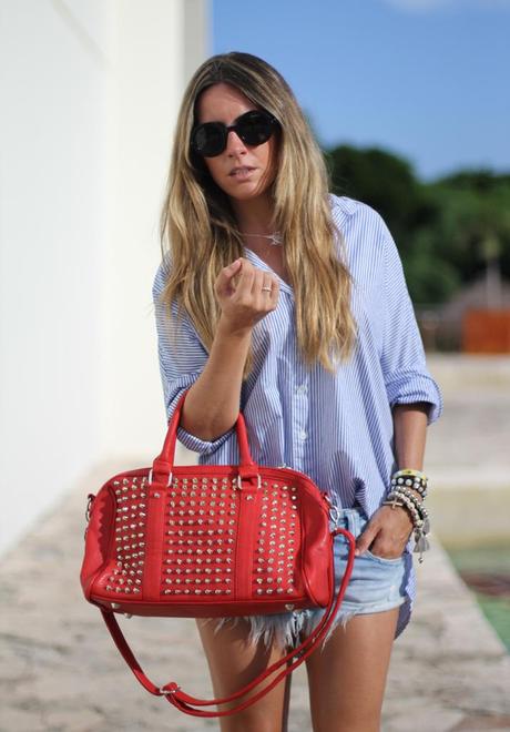 Outfit with boyfriend shirt, denim shorts and studded bag