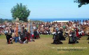 Fiestas de Virgen de Guia, en Llanes: Reverencia, bollo y ramo