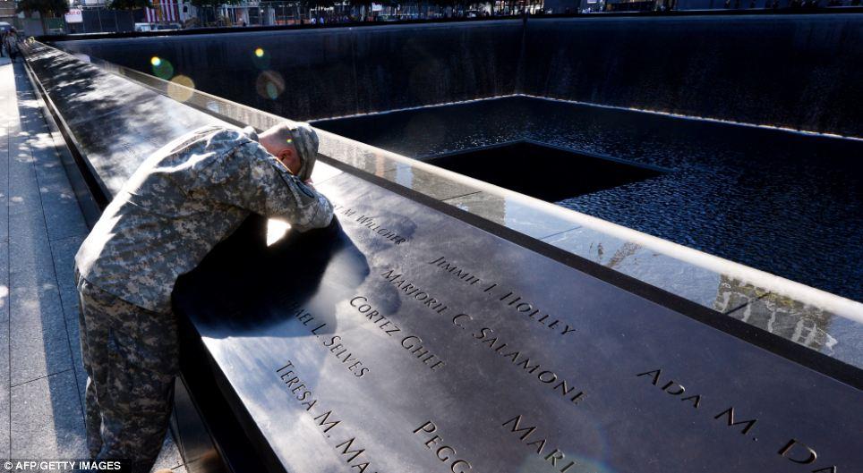 Pain: Scott Willens, who joined the United States Army three days after the terrorist attacks on 9/11/01, pauses as he reflects by the South Pool on friends he has lost while on deployment