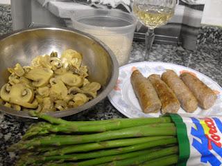 Arroz con champiñones, espárragos y butifarra.