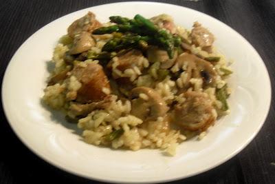 Arroz con champiñones, espárragos y butifarra.