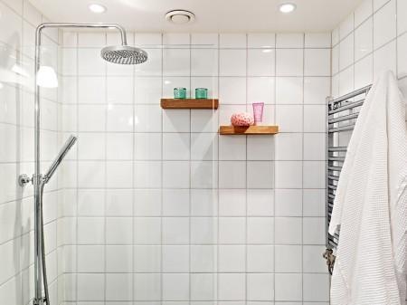 suelo de madera oscuro sofá gris sitio de almacenaje cocina sillas eames patas madera negras silla diamante metal negro nichos de obra decoración muebles de diseño nórdicos muebles de diseño lámparas de diseño decoración interiorismo estudios y pisos pequeños inspiración nórdica falsa chimenea de aceite estilo sueco decoración estilo nórdico diseño nórdico diseño de interiores de estudios diseño de interiores decoración pisos pequeños decoración nórdica decoración estudio decoración en blanco decoración de interiores deco blogger cogines para sillas eames blog interiorismo nórdico blog interiorismo blog interiores blog estilo nórdico blog decoración nórdica blog deco accesorios para el hogar estilo nórdico 