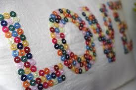 Personalizamos un cojín con botones