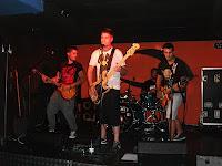 Sin Arreglo en concierto