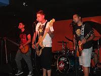 Sin Arreglo en concierto