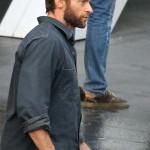 EXCLUSIVE: Hugh Jackman, in character as Wolverine, grins as he gets into a high-powered Audi R8 sports car. The 43 year old also pulled what appeared to be a karate move as he climbed into the impressive-looking black vehicle. The muscular star was filming scenes for new movie 'The Wolverine' in Sydney, Australia. Part of Sydney appeared to have been transformed into a Japanese city for the latest scene. Also filming with Hugh was co-star Rila Fukushima, who plays a red-haired assassin called Yukio. Rila looked striking with her red hair and Goth-style clothes, whereas Hugh looking quite ordinary in his slacks, blue shirt and hiking boots. Also spotted on set was the film's director, James Mangold. The pics were taken in Sydney on Oct 6.Pictured: Hugh Jackman Ref: SPL444618  061012   EXCLUSIVEPicture by: SplashSplash News and PicturesLos Angeles:	310-821-2666New York:	212-619-2666London:	870-934-2666photodesk@splashnews.com