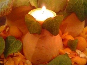 Velas en calabazas para decorar en Halloween