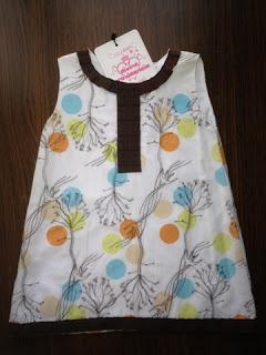 Ganadores de dos vestidos de niña cortesía de Divina Providencia