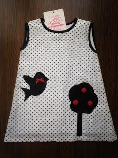 Ganadores de dos vestidos de niña cortesía de Divina Providencia