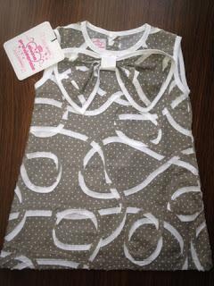 Ganadores de dos vestidos de niña cortesía de Divina Providencia