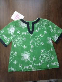 Ganadores de dos vestidos de niña cortesía de Divina Providencia