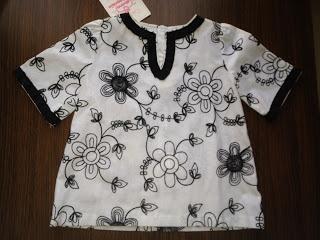 Ganadores de dos vestidos de niña cortesía de Divina Providencia