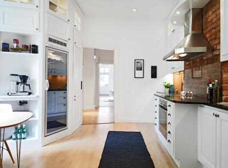 suelo de parquet de arce sillas eames blancas muebles de los 50 eames muebles de diseño moldura y rosetones en techo mesa ikea mecedora eames blanca lamparas de ikea estilo nórdico diseño de interiores decoración sueca decoración nórdica decoración escandinava decoración en blanco decoración elegante nórdica decoración de interiores decoración de dormitorios decoración de comedores decoración comedores deco blogger cocinas modernas suecas cocinas blancas chimeneas suecas con losetas labradas chimenea sueca blog interiorismo nórdico blog decoración nórdica blog deco 