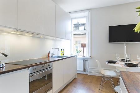 zócalos altos rodapies altos decoración muebles de diseño decoración interiores decoracion encimera cocina nogal decoración diseño interiores diseño casas decorar pisos pequeños decorar piso pequeño decorar casa decoración pisos pequeños decoración nórdica decoración minimalista decoración interiores decoración interior decoracion hogar pequeño decoración en blanco decoración ático diáfano cuadro abstracto decoración cocinas modernas cocinas blancas chimenea redonda blanca decoración casa decoración blogs decoración blog interiorismo 