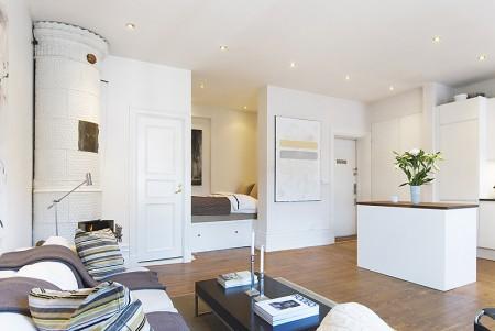 zócalos altos rodapies altos decoración muebles de diseño decoración interiores decoracion encimera cocina nogal decoración diseño interiores diseño casas decorar pisos pequeños decorar piso pequeño decorar casa decoración pisos pequeños decoración nórdica decoración minimalista decoración interiores decoración interior decoracion hogar pequeño decoración en blanco decoración ático diáfano cuadro abstracto decoración cocinas modernas cocinas blancas chimenea redonda blanca decoración casa decoración blogs decoración blog interiorismo 