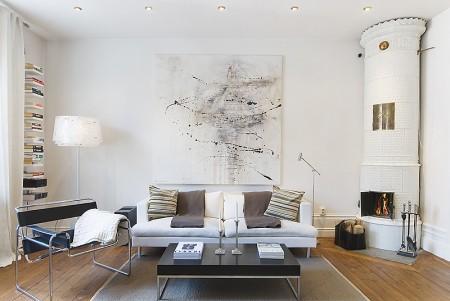 zócalos altos rodapies altos decoración muebles de diseño decoración interiores decoracion encimera cocina nogal decoración diseño interiores diseño casas decorar pisos pequeños decorar piso pequeño decorar casa decoración pisos pequeños decoración nórdica decoración minimalista decoración interiores decoración interior decoracion hogar pequeño decoración en blanco decoración ático diáfano cuadro abstracto decoración cocinas modernas cocinas blancas chimenea redonda blanca decoración casa decoración blogs decoración blog interiorismo 