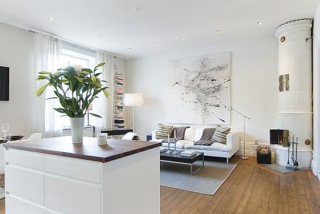 zócalos altos rodapies altos decoración muebles de diseño decoración interiores decoracion encimera cocina nogal decoración diseño interiores diseño casas decorar pisos pequeños decorar piso pequeño decorar casa decoración pisos pequeños decoración nórdica decoración minimalista decoración interiores decoración interior decoracion hogar pequeño decoración en blanco decoración ático diáfano cuadro abstracto decoración cocinas modernas cocinas blancas chimenea redonda blanca decoración casa decoración blogs decoración blog interiorismo 