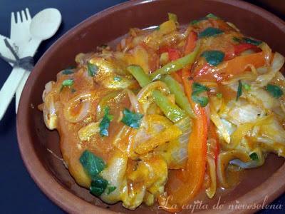 Manitas en salsa de tomate