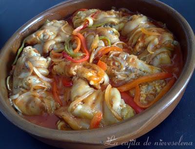 Manitas en salsa de tomate