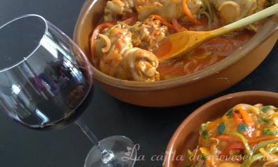 Manitas en salsa de tomate