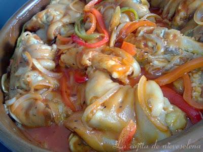 Manitas en salsa de tomate