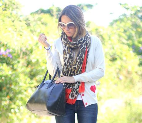 Blogger wearing jeans and animal print scarf