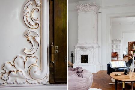 techos altos molduras suelo espigado madera roble salón comedor nórdico rodapíes altos madera revista hsm madrid puertas dobles paneladas blancas paredes paneladas madera muebles de diseño mobiliario moderno mobiliario diseño grandes ventanales estilo nórdico elementos arquitectónicos clásicos diseño nórdico diseño escandinavo diseño de interiores delikatissen revista hsm madrid decoración nórdica decoración interiores nórdico 