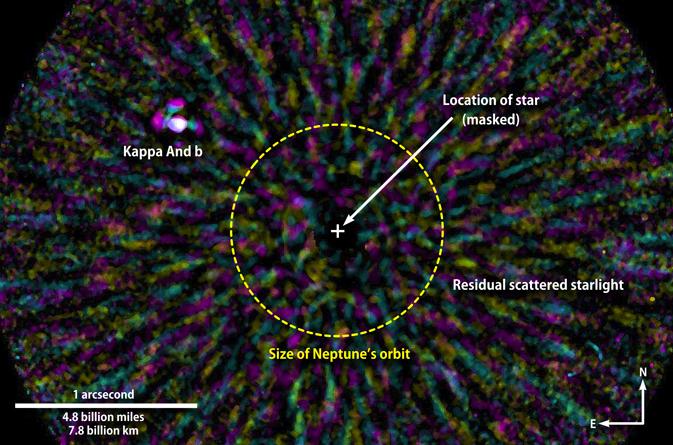 This false-color near-infrared image has been processed to remove most of the scattered light from the star Kappa Andromedae (masked out at center).