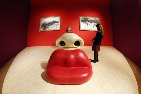 A visitor looks at the Rita Mae West room by Salvador Dali