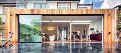 Ampliacion Minimalista en Casa Tradicional Inglesa