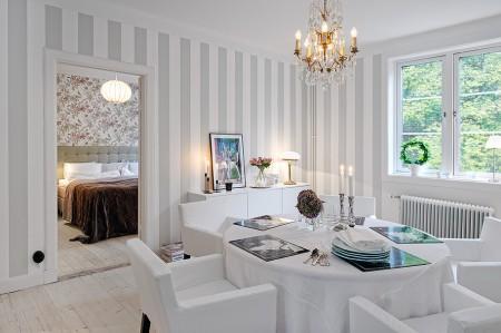 vigas en el techo atico ventanas en el techo suelo de baldosas hidraúlicas paredes paneladas madera blancas papel pintado de pared mobiliario sencillo decoración lámparas de diseño estilo nórdico estilo escandinavo diseño de interiores diseño de dúplex diseño de aticos decoración detalles decoración de interiores decoración de dúplex decoración de áticos baldosa hidraulica mosaico alfombras persas 