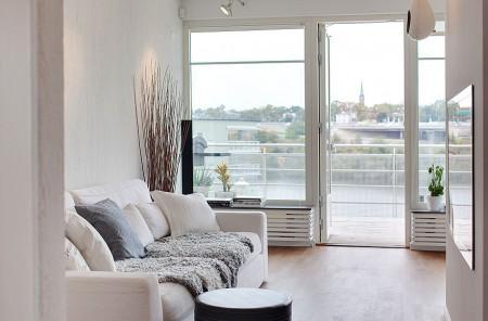 suelo de roble teñido grandes ventanales estilo nórdico estilo escandinavo diseño nórdico diseño de interiores diseño de áticos diáfanos decoración nórdica decoración falta de intimidad decoración de interiores y aticos cocina moderna cocina industrial cocina gris cocina en acero inoxidable carpintería de calidad decoración calefaccion por suelo radiantes blog decoración blog de interiores atico nórdico con vistas 