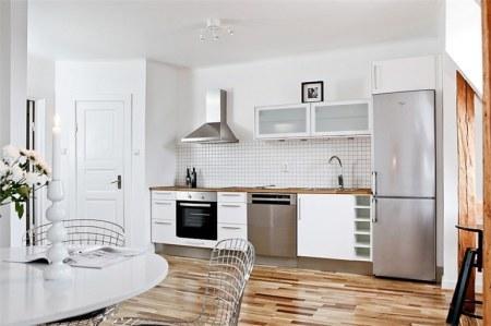 vigas de madera ático suelos de roble espigado sofa blanco ikea sillas emaes dsx side chair bertoia promoción kenay home muebles vitra muebles knoll muebles eames muebles de diseño contemporáneo lounge chair eames diseño nórdico diseño de interiores decoración sueca decoración salones decoración nórdica decoración escandinava decoración en blanco decoración de interiores decoración de áticos decoración comedores decoración cocinas cocinas modernas blog nórdico blog interiorismo blog decoración 