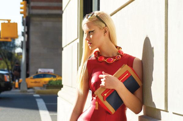 girl in red with clutch