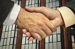 two businessmen shaking hands