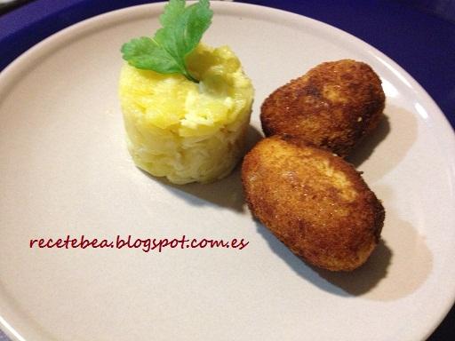 Revuelto de patata con croquetas de jamón