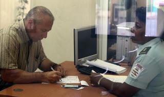 Puesta a punto organización para aplicar regulaciones migratorias en Cuba