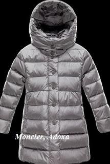 Katie Holmes y Suri Cruise, muy conjuntadas. Consigue su plumífero