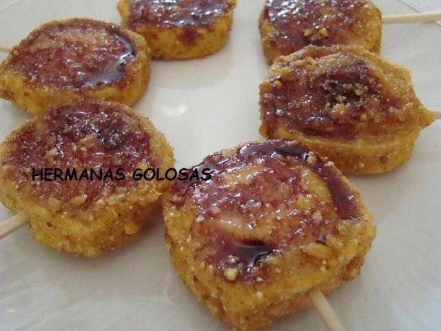 QUESO DE CABRA EN COSTRA DE MAÍZ FRITO CON REDUCCIÓN DE VINO TINTO A LA MIEL